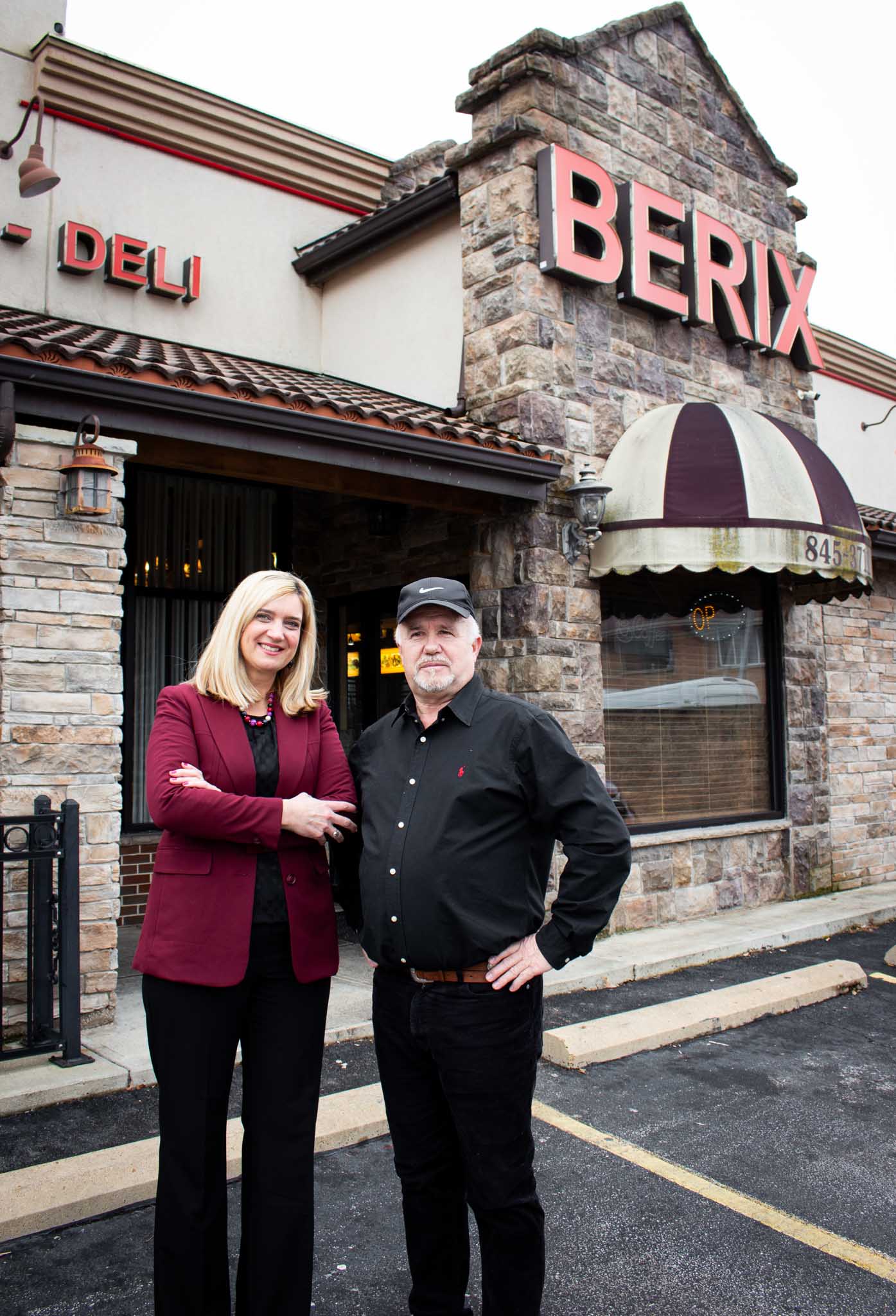 Amira and Beriz in front of restaurant 